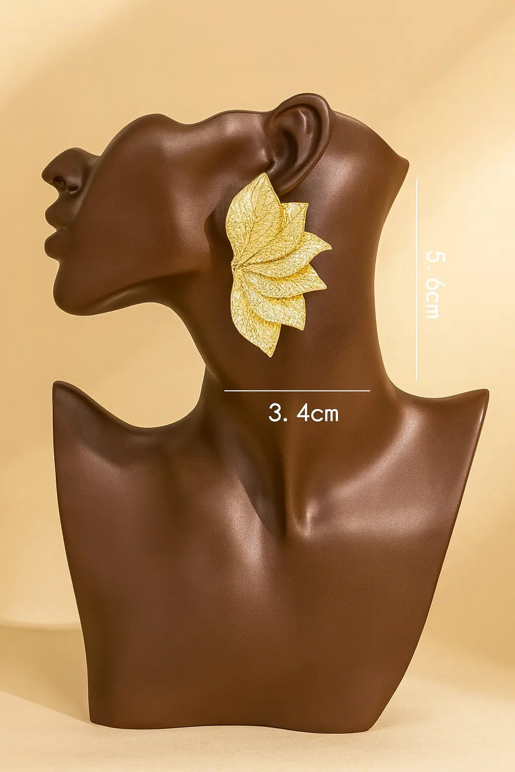 Boucles d’oreilles en forme de feuille – Doré texturé UMII