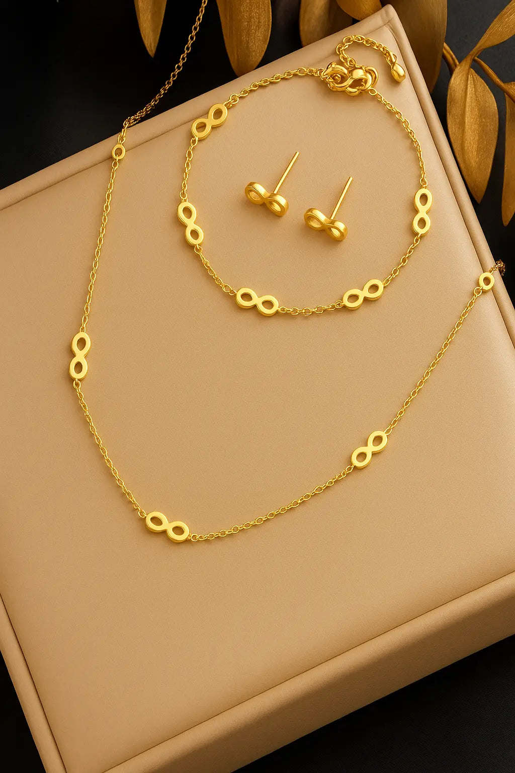 Parure plaquée or – Symbole Infini en acier inoxydable UMII